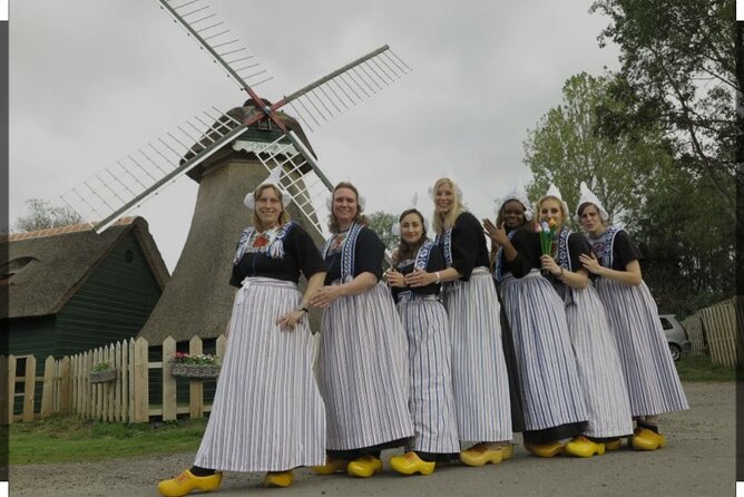 Private Minivan Zaanse Schans and Volendam Tour from Amsterdam - Zaanse Schans: windmills, gabled houses, cheese shop choices, and museum time