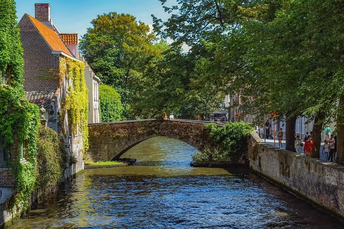 Private sightseeing tour to Bruges and chocolate from Amsterdam - Belfort Tower Stop: The View, the Climb, and Time Math