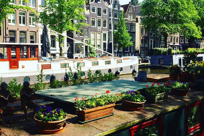 Private Tour: Amsterdam's City Highlights and Hidden Gems - Stop 4: Canal Ring (Grachtengordel) and canal houses you can actually read