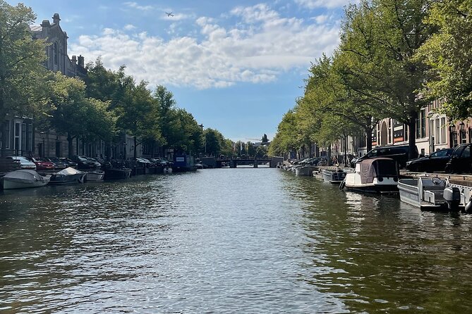 Private Walking Tour of Amsterdam - A Monet-painted church and the place Rembrandt is resting
