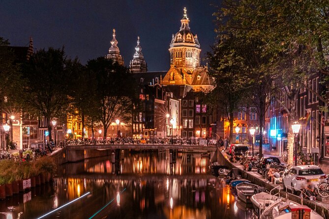 Red Light District Tour - It's History & It's Future - Condomerie and the Beurs van Berlage Ending: Light, Then Architecture