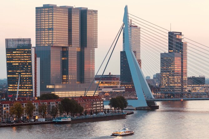 Rotterdam, Delft and The Hague Small Group Tour from Amsterdam - Delft’s Markt and church viewpoints: Nieuwe Kerk, Oude Kerk, and Stadhuis