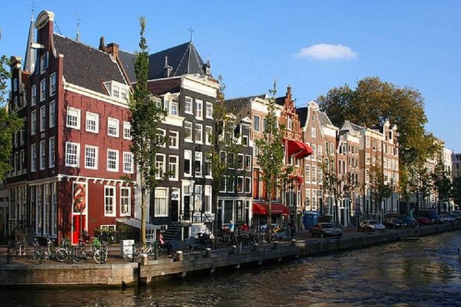 Secrets of Amsterdam Walking Tour plus Dutch Sweets Tasting - Nieuwmarkt and de Waag: Rembrandt’s connection