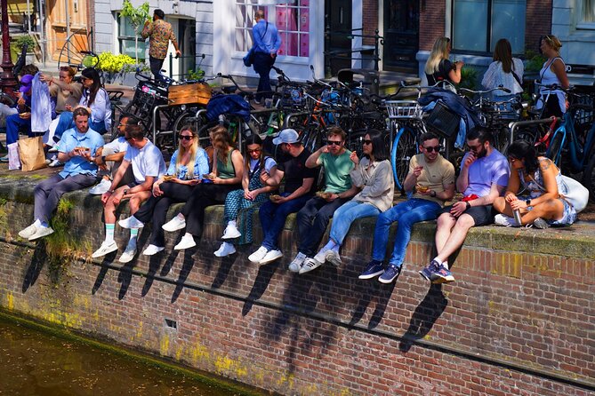 Skipping Lines & Sipping Beers: A History Tour of Amsterdam - Beursplein and the oldest street feel