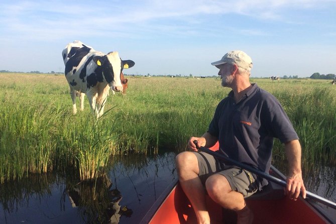 Small-Group Guided Sunset Canoe Tour in Waterland with Dinner - Entering Waterland by meeting Majel, then heading out on calm water
