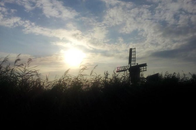 Small-Group Guided Sunset Canoe Tour in Waterland with Dinner - Paddling pace and what to expect from the guide’s style