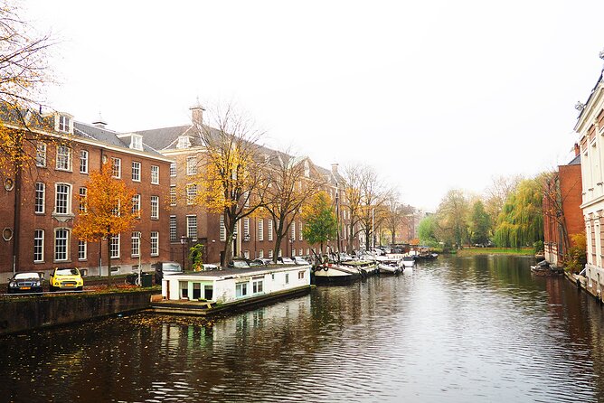Small Group Hidden Gems Tour in Amsterdam - ARTIS Zoo Time: Flamingos and Influential Amsterdam Names