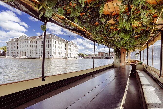 Small-Group Luxury Canal Cruise with Local Skipper - Crooked canal houses near the Amstel, finishing strong