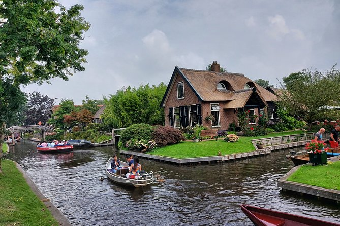 Small-Group Tour to Windmills & Giethoorn with boat tour - Zaanse Schans windmills: museums, wooden shoes, and cheese tasting
