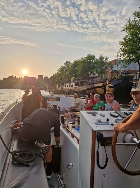 Smoke & Boat Amsterdam - The Official 420 Canal Cruise - Leidsekade 98: boarding close to the Bulldog Palace
