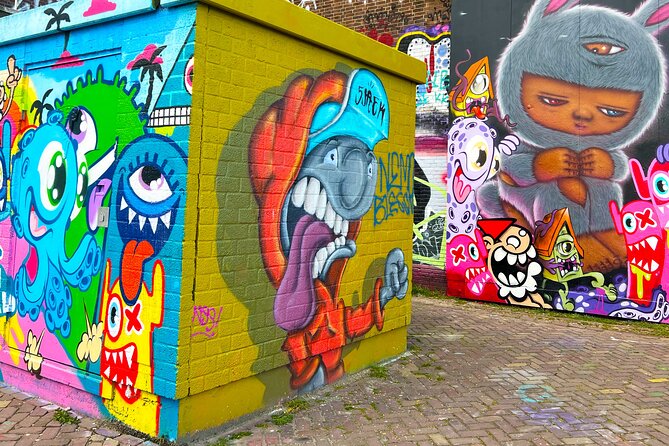 Street Art Walking Tour, private local Dutch guide - Stop 2: Amsterdam Centraal and Street Art Frankey’s hidden sculpture