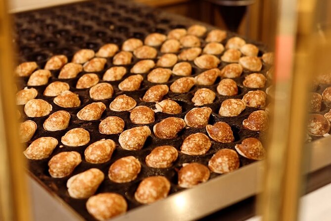 Top 10 Tastes of Amsterdam: Guided Walking Food Tour - Haarlemmerdijk herring plus battered cod bites: the classic salty test