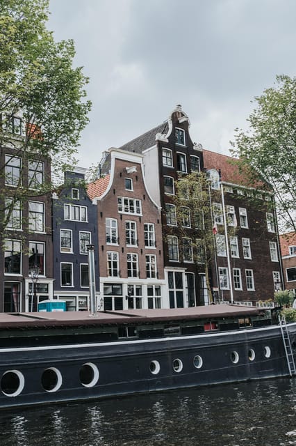 Tour of the historical center of Amsterdam in Italian - Flower Market finish: last photos, shopping, and where to eat next