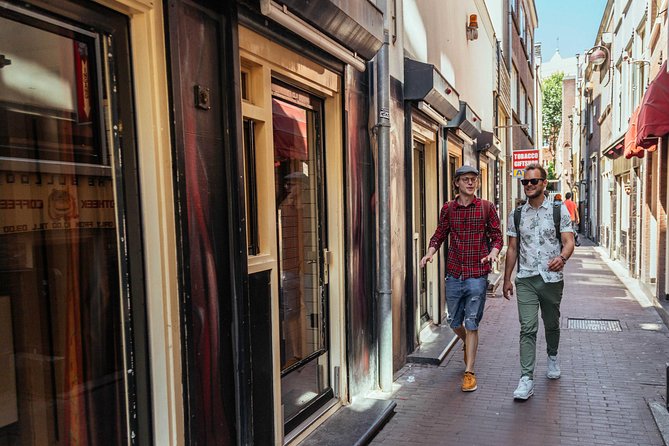 Treasures of Amsterdam: Coffeeshops & Red Light District Private Tour - Zeedijk and the wider mix beyond the windows