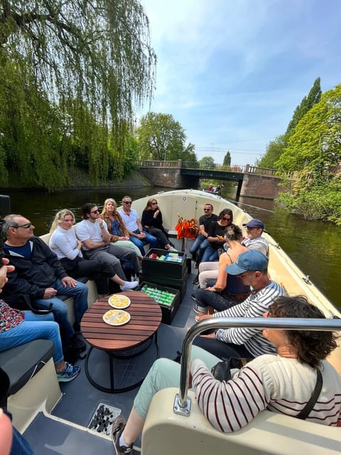Visit Amsterdam by Boat with a French Guide (french) - Key highlights you will feel right away
