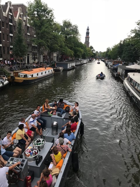 Visit Amsterdam by Boat with a French Guide (french) - Boarding at Oosterdokskade 8, just a short walk from Centraal