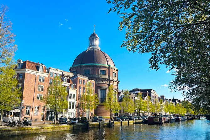 Walking Tour about Golden Age Architecture, private local guide - Dam Square to Royal Palace Amsterdam: power, style, and building on difficult ground