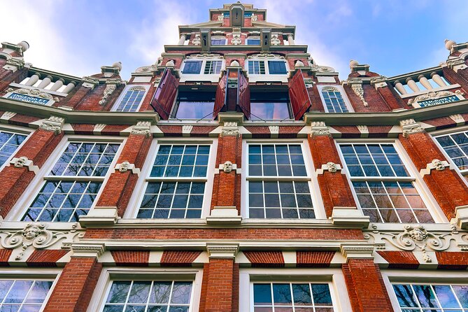 Walking Tour about Golden Age Architecture, private local guide - Canal-belt baroque at Huis Bartolotti and Torensluis, plus a look at crooked houses