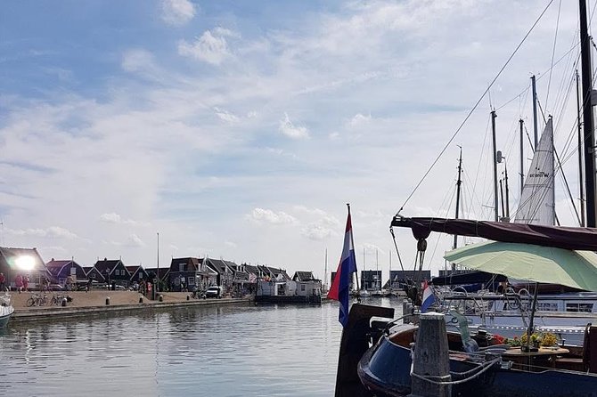 Zaanse Schans and Volendam Private Tour – Clogs, Cheese and More - Clocks and wooden shoes: the live clog-making stop you can actually watch