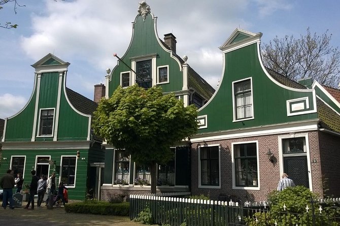 Zaanse Schans and Volendam Private Tour from Amsterdam - Volendam Haven: Dike Walk, Harbor Views, and a Boat Ride Toward Marken