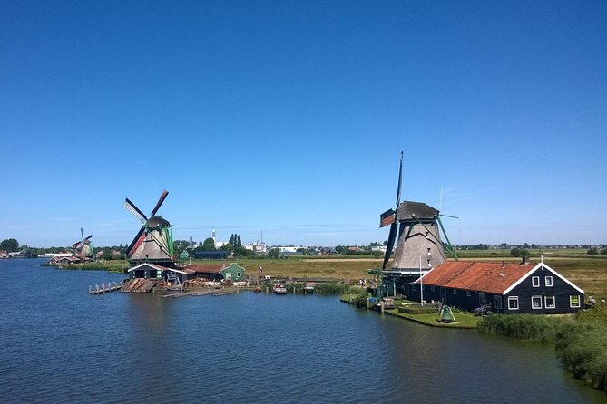 Zaanse Schans Windmills Private Tour from Amsterdam Airport - Kooijman Souvenirs and Clogs Workshop: Watching Shoes Get Made